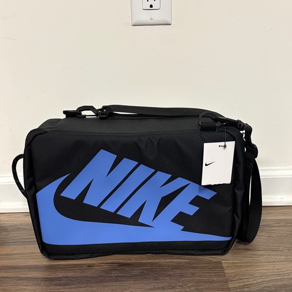 Nike Other - Nike Men's Black Duffel Bag with Blue Logo